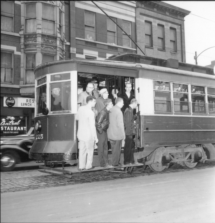 Car #225 on Clark Street, on an Illini Railroad Club fantrip, February 10, 1957. No, the car is not moving- this is a posed shot. (CTA Historical Collection)