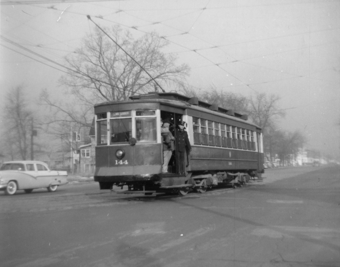 CTA #144 on the 12-29-57 fantrip, at 81st and Vincennes, on Vincennes Avenue looking north (Author's collection)