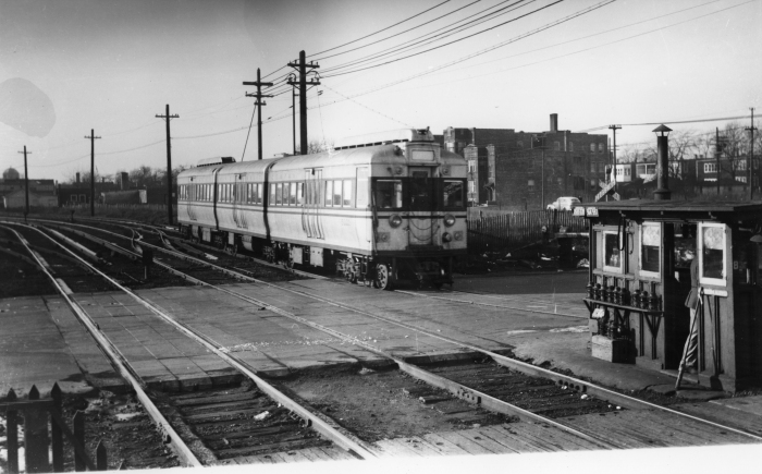 CTA 5002 westbound at Laramie, December 1947. The four experimental articulated cars were patterned after the earlier BMT "Bluebirds" in New York. While they were ordered by CRT in their waning days, the fledgling CTA and the City of Chicago stage-managed this behind the scenes, as they also did with the CSL order for 600 "Green Hornet" streetcars. Car 5001 was already on CRT property before CTA took over on October 1, 1947. (Photographer unknown)
