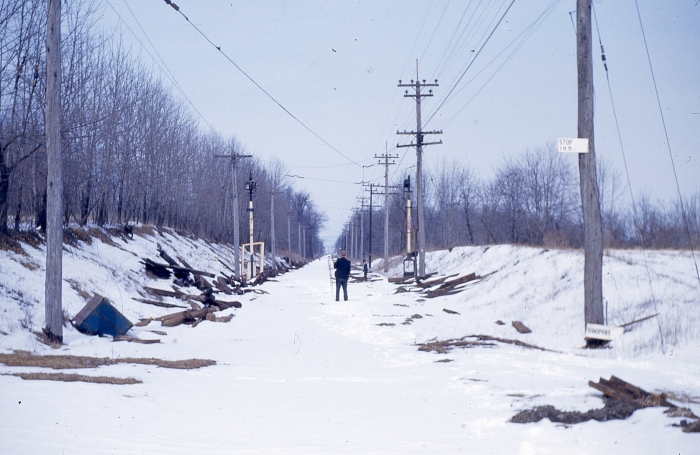 The abandoned right-of-way of the Liberty Bell Limited interurban in Pennsylvania, during the winter of 1951-52. Some of the signals from this line are now in use at the Seashore Trolley Museum in Maine. (Author's collection)