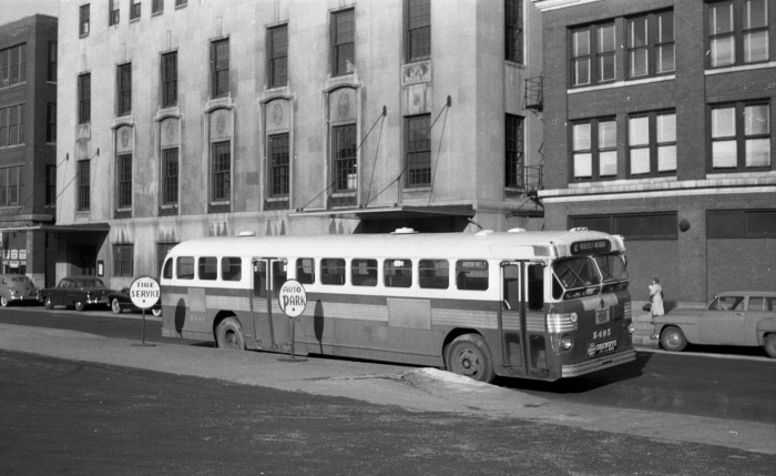 Frame 14 - "Bus 5495 as 12-Roosevelt on layover on East 11th Street between Wabash and Michigan." -GF "Fageol Twin Coach propane bus... note Getz Theater building behind bus (Indiana limestone building)." -JW