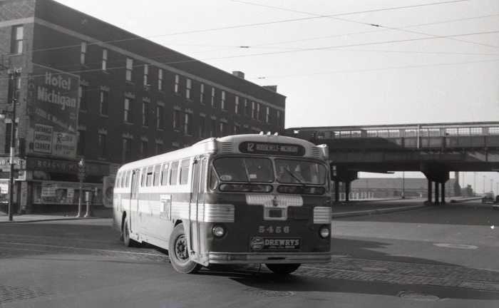 Frame 17 - "Bus 5456 as 12-Roosevelt turning from eastbound Roosevelt to northbound Wabash on its terminal loop, 11th, Michigan, and back to Roosevelt. Roosevelt west of Wabash is paved and dewired." -GF "Fageol Twin Coach" -JW