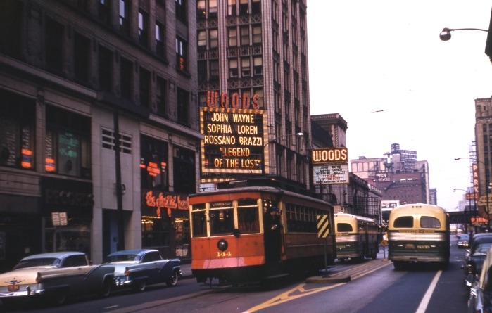 CTA #144 on an Illini Railroad Club fantrip in December, 1957. We are looking north on Dearborn Street near Randolph. We see buses here since by this time, PCCs did not run on weekends on the #22 Clark-Wentworth line. (Author's collection)