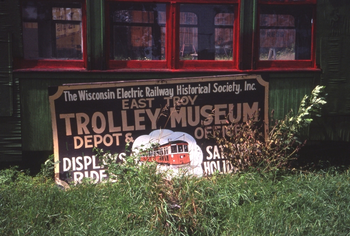 A discarded sign from the original East Troy museum group, as it appeared in August 1987. (Photo by David Sadowski)