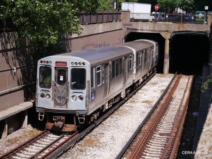 A Red Line train emerges from the subway just south of Roosevelt Road.