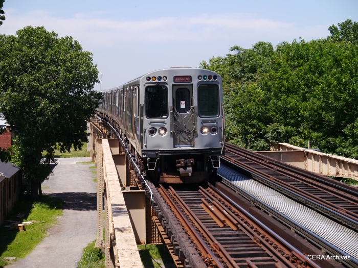 A Red Line train using older equipment heads south at Indiana Avenue.