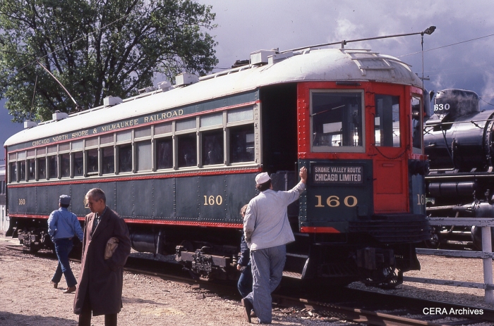 The North Shore Line left a legacy that continues to enrich our lives today. Here we see car 160 at the Illinois Railway Museum in the mid-1980s. Emerson Wakefield, the author's uncle, is walking away from the car. (Photo by David Sadowski)