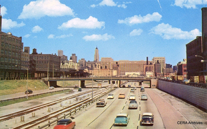 The Congress Expressway circa 1956-7. Tracks are in the median, but no third rail or stations yet. Meanwhile, the old Garfield Park alignment was still in place, including the double-island Halsted "L" station. (Photographer unknown)