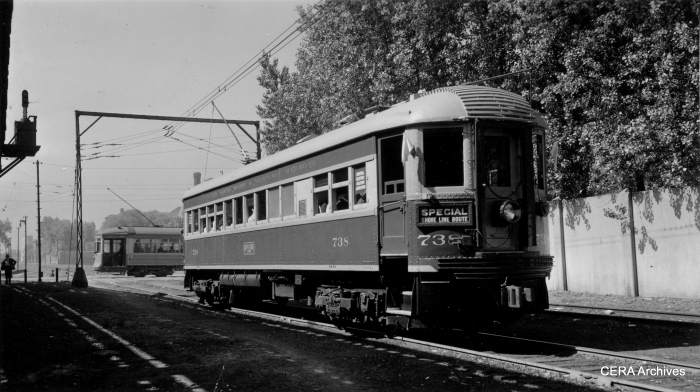CNS&M 738 at Buena Yard (near Irving Park Road) on 6-16-40. That's a CSL streetcar in the background, and Graceland cemetery behind the wall. (Photo by George Krambles, John Nicholson Collection)