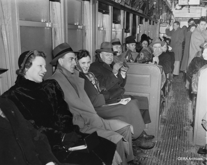 February 24, 1950 - CTA "L" riders were cheerful despite the obvious lack of amenities on the trains. "A rush hour crowd shivers aboard an elevated train. They were victims of Chicago's first zero cold snap today, which happened at the same time that the transit authorities cut off all heat in their vehicles to conserve coal. The result: cold customers." (Photographer unknown)
