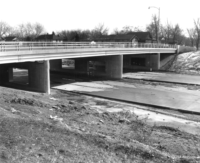 February 10, 1954 - "Most of the paving that has been done on the highway has been done in Maywood. This is the scene at 5th av., Maywood, where an overpass crosses the highway." (Photographer unknown)