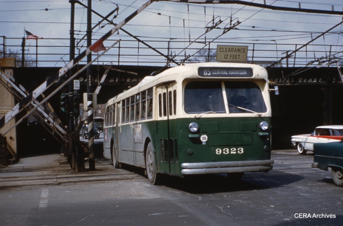 CTA Central Avenue trolley bus 9323 crosses the "L" on April 15, 1960. (Photo by Ray DeGroote)