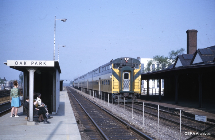 The bi-level is moving towards the camera in this May 1964 scene, since the C&NW runs left-hand. (Unknown Photographer)