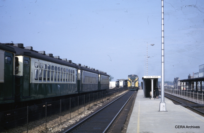 CTA 4000s meet C&NW bi-levels on the embankment in May 1964. (Unknown Photographer)