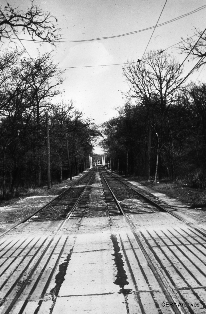 West Towns private right-of-way through the Forest Preserves. According to Michael Murray, this is "where the line crossed 1st Ave. just east of the zoo. That photo looks east toward the Des Plaines River crossing and Riverside." (Photographer Unknown)
