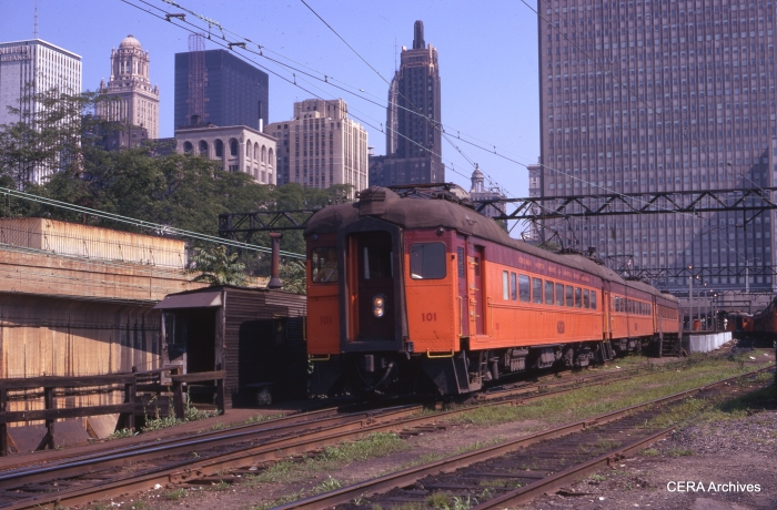 Combine 1010 heads up a train in July 1971. This is the present area of Millenium Park. (Photographer Unknown)