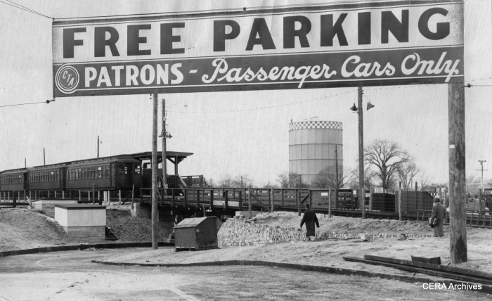The CTA opened a free "park'n'ride" lot at DesPlaines Avenue on December 15, 1953. The large gas tank in the background was a Forest Park landmark for years. (Photographer unknown)