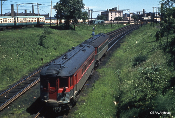 CNS&M "Silverliner" 251 (now preserved at the Illinois Railway Museum) is at the rear of a two-car train approaching Howard. (CERA Archives)