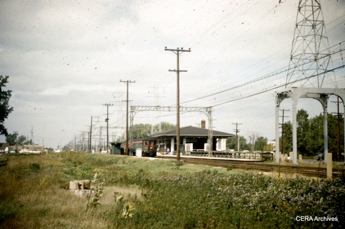 A view of the Dempster station as it looked in October 1961, with just over a year of North Shore Line service remaining. To the south of the Insull-era building, you can see the remnants of the high-level platform that would have been used for CRT Niles Center service. These were removed by CTA and a new, very basic platform was built for Swift service. (CERA Archives)