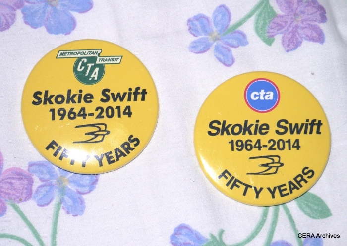 Officials handed out two commemorative pinback buttons on the special train, with the old and new CTA logos.