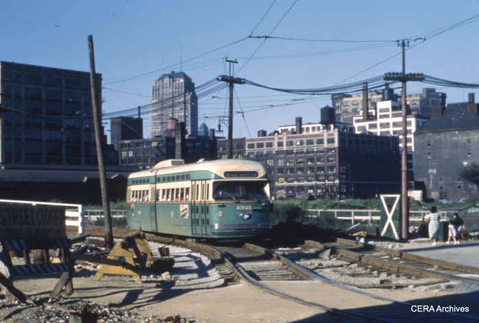 Post-war PCC 4321 negotiates shoo-fly trackage on Halsted, related to construction of the Congress Expressway, in this 1952 scene.