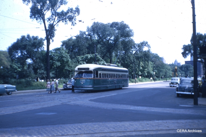 Car 7180, northbound at Clark and Wells on route 22, discharges passengers near Lincoln Park in the mid-1950s.