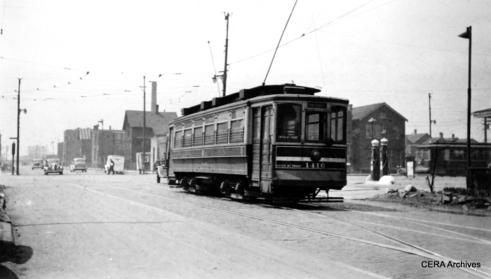 One-man city car 1416. Note the classic gas pumps at right. (R. J. Anderson Photo - CERA Archives)