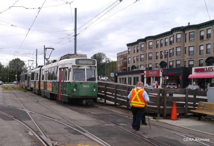 Workers switching a two-car train for the return trip from Cleveland Circle.