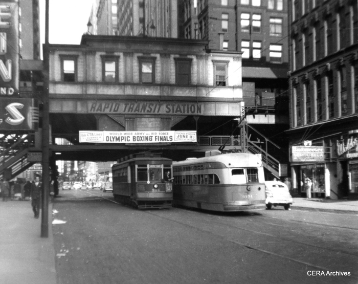 CTA red Pullman 594 passes Pullman PCC 4131 at Madison and Wells in 1947. There is about 40 years' difference in ages between the cars. The PCC is a Madison car, and 594 is on a variant of the Milwaukee route. We are looking east. (CERA Archives)