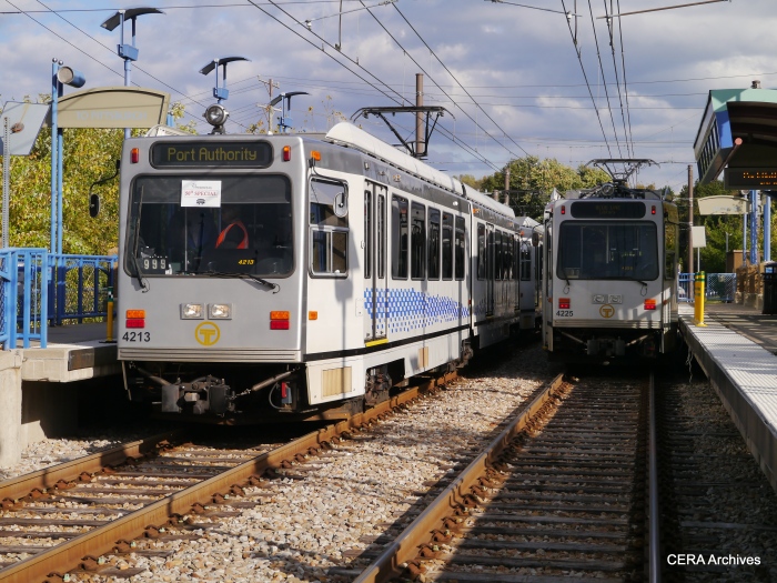 The PAT fantrip train, led by 4213, prepares to depart Library station while regular service car 4225 will go into the pocket track (October 5, 2014).