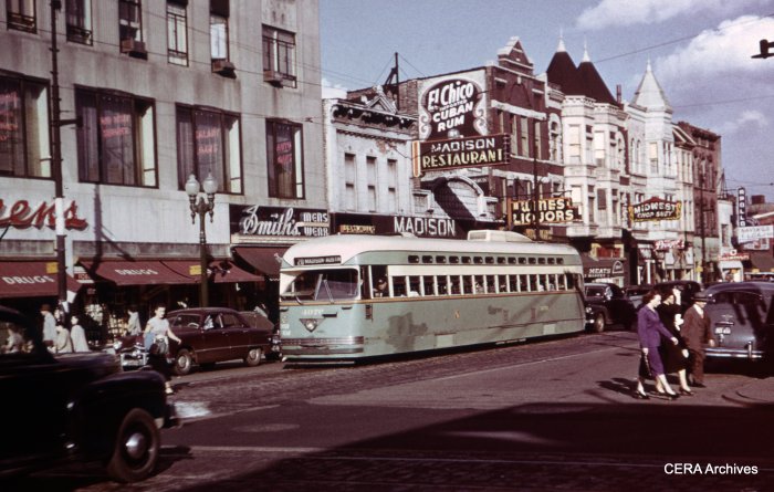 CTA Pullman PCC 4076 at Madison and Pulaski in 1949, showing patches of paint of a distinctly darker hue. At one time, this was one of the busiest shopping areas in the city. (James J. Buckley Photo - CERA Archives)
