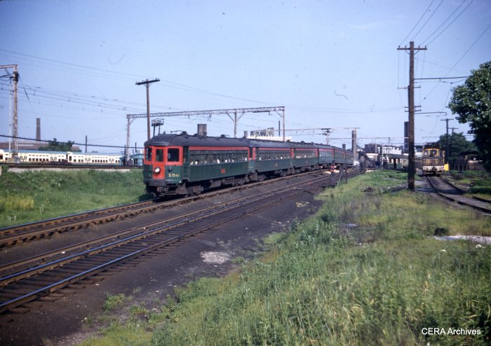 CNS&M 156 leads up an outbound six car train just north of Howard, going into the Skokie Valley Route. This came from a "superslide," shot on size 828 Kodachrome roll film, yielding an image slightly larger than 35mm. (W. H. Higginbotham Photo - CERA Archives)